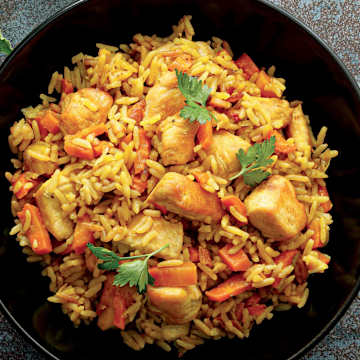 Crispy Chicken Thighs with Carrots and Rice Pilaf