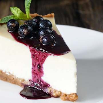 Vanilla Cheesecake with Roasted Berry Topping