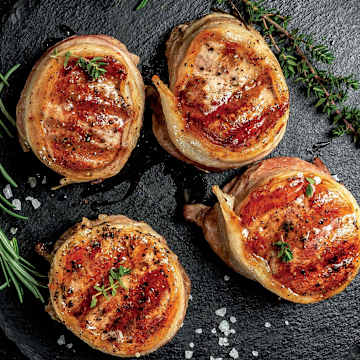 Bacon-Wrapped Pork Chops with Brussels Sprouts and Couscous