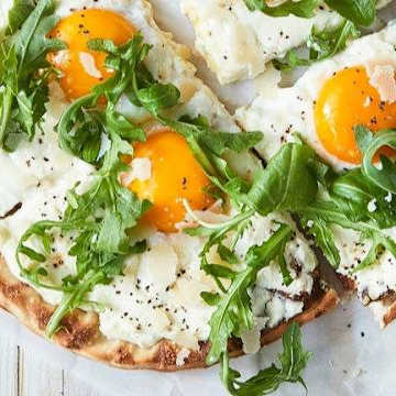 Grilled Pizza with Eggs and Greens