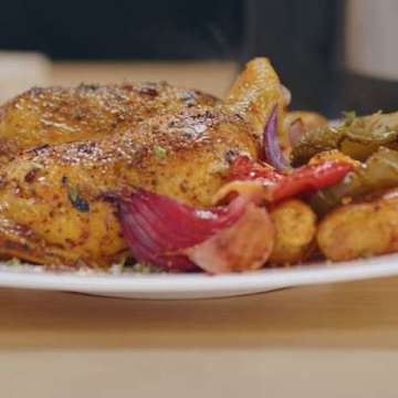 Roasted Chicken Legs With New Potatoes, Fennel And Peppers