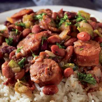 Plant-Based Sausages with Peppers, Broccoli, and Rice & Beans