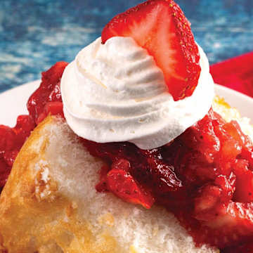 White Cake with Whipped Cream and Strawberry Compote