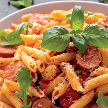 Italian Sausages with Cherry Tomatoes, Gluten-Free Pasta, and Blush Sauce