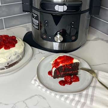 Chocolate Cake with Raspberry Filling and Orange Zest Frosting