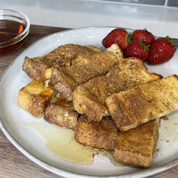 Gingerbread French Toast Sticks with Vanilla Spiked Maple Syrup