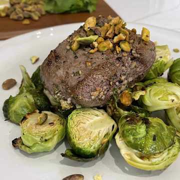 Mint and Garlic Rubbed Filet with Seared Brussels Sprouts and Crushed Pistachios