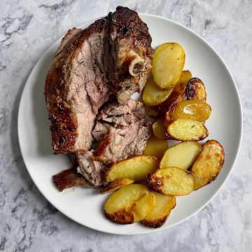 Roast Lamb Shoulder with Crispy Potatoes
