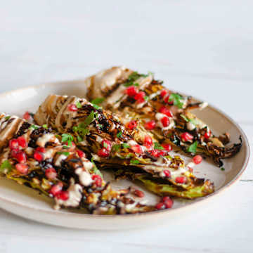 Grilled Hispi Cabbage with Tahini Dressing