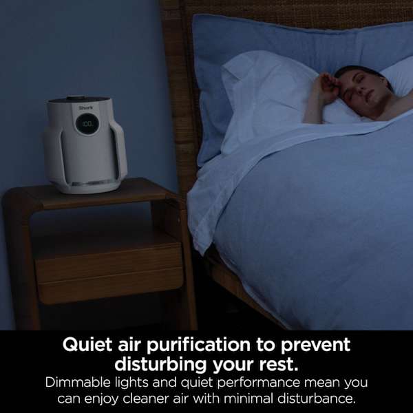 Official Shark image: Compact Pro on a bedside table at night
