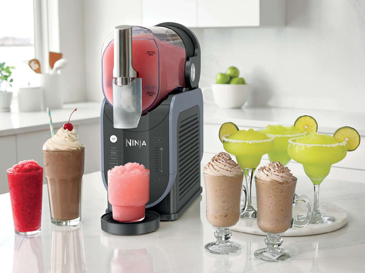 Ninja SLUSHi machine with frozen drinks displayed on a kitchen counter