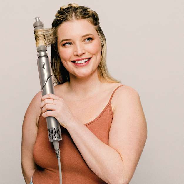 Woman with flexstyle in hands