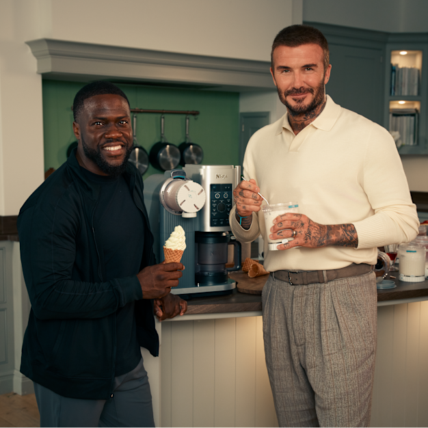 Kevin Hart and David Beckham holding an ice cream made with the Ninja Swirl by CREAMi