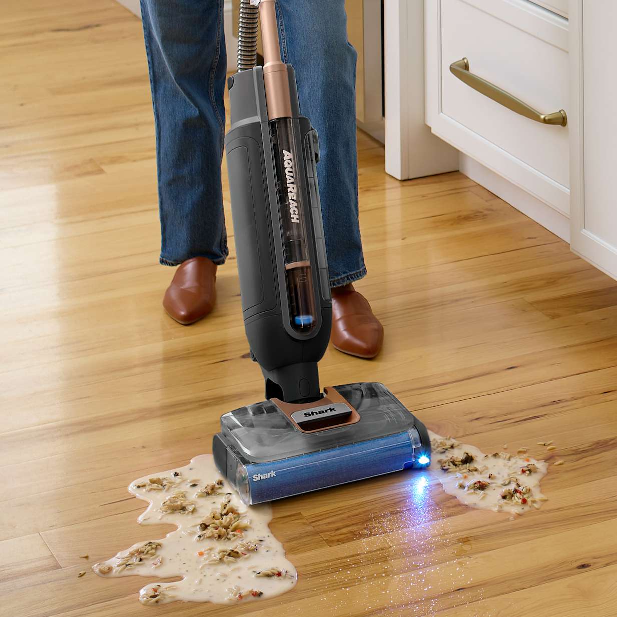 Stop cleaning twice.  Vacuum & mop at the  same time.