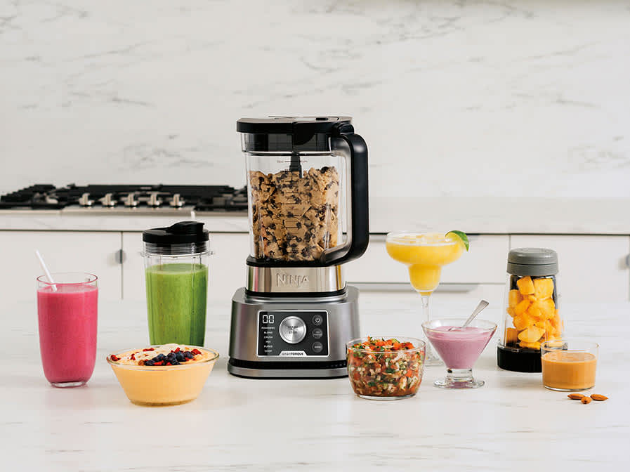 A Ninja blender on a kitchen counter top 