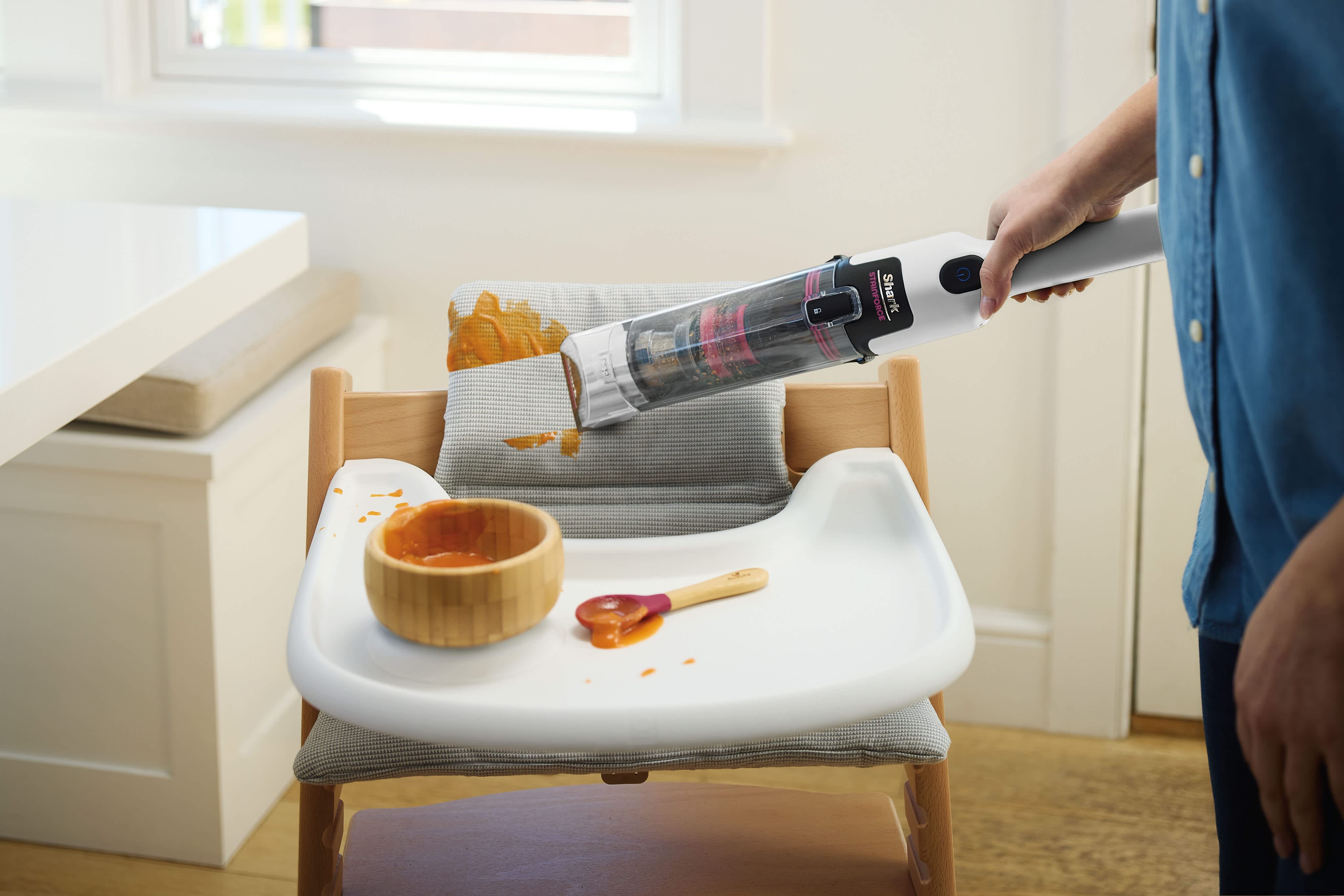 removing food mess from a child's high chair