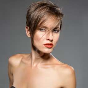 Asymmetrical hair cut with fringe