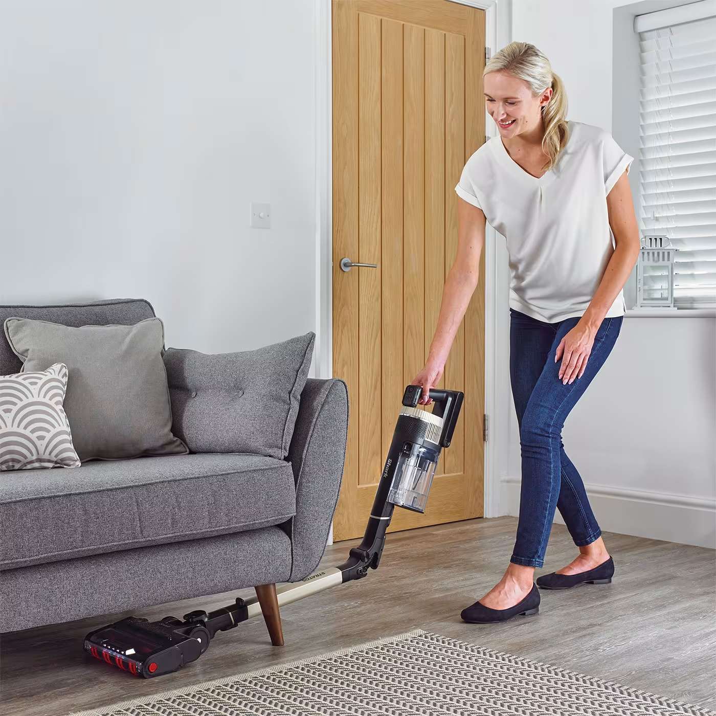 Vacuuming under couch