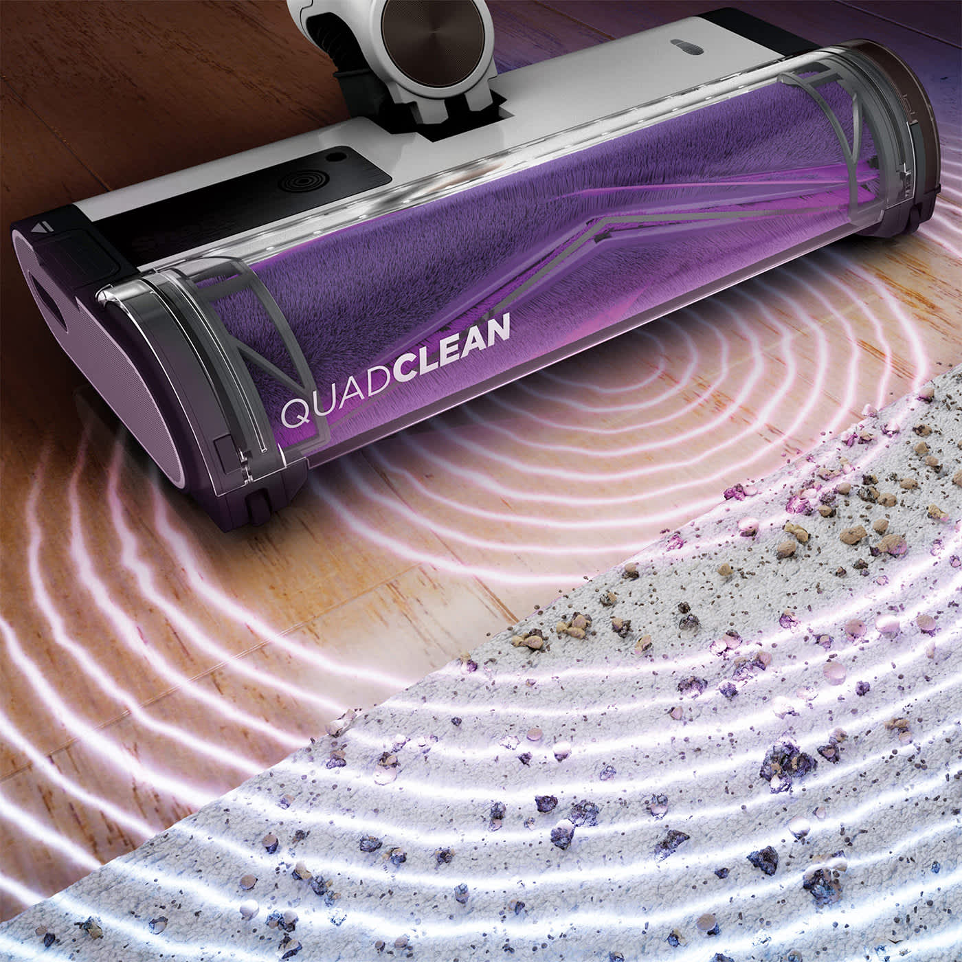 Aspirateur sans fil Shark aspirant des graviers.