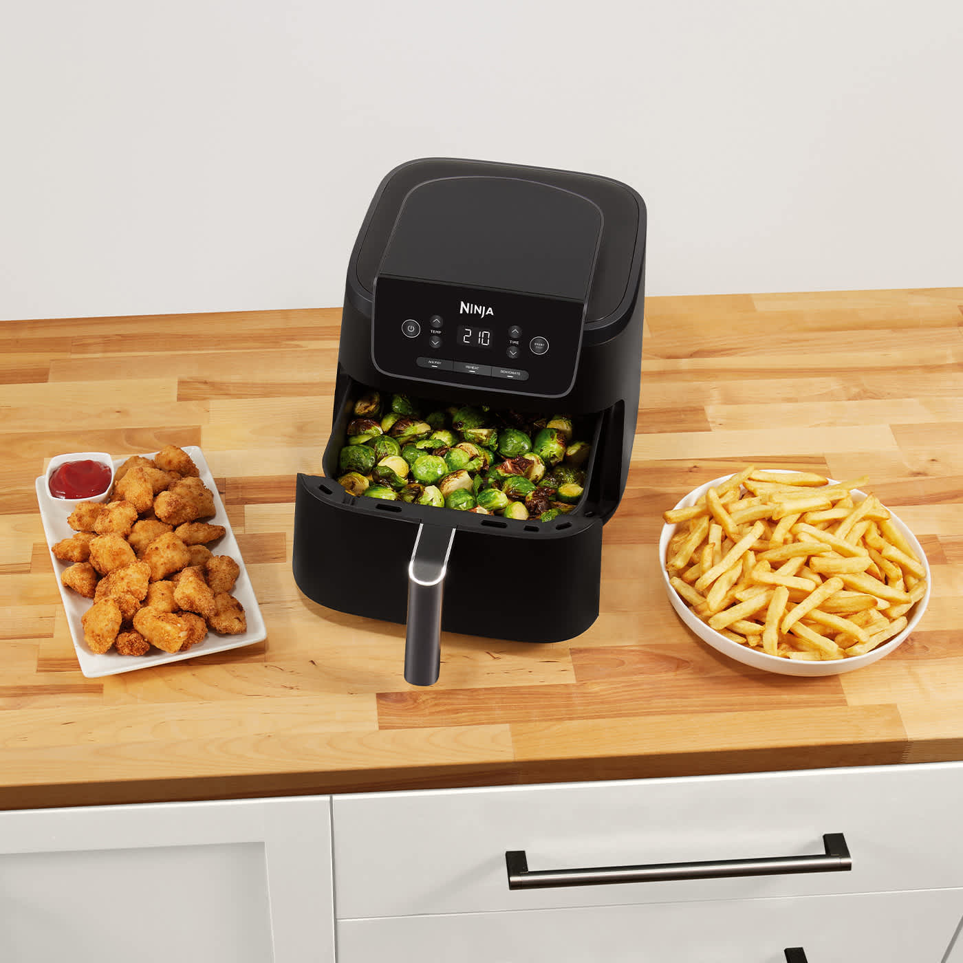Air fryers avec une zone de cuisson