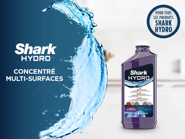 Aspirateur Shark branch&eacute; au mur.
