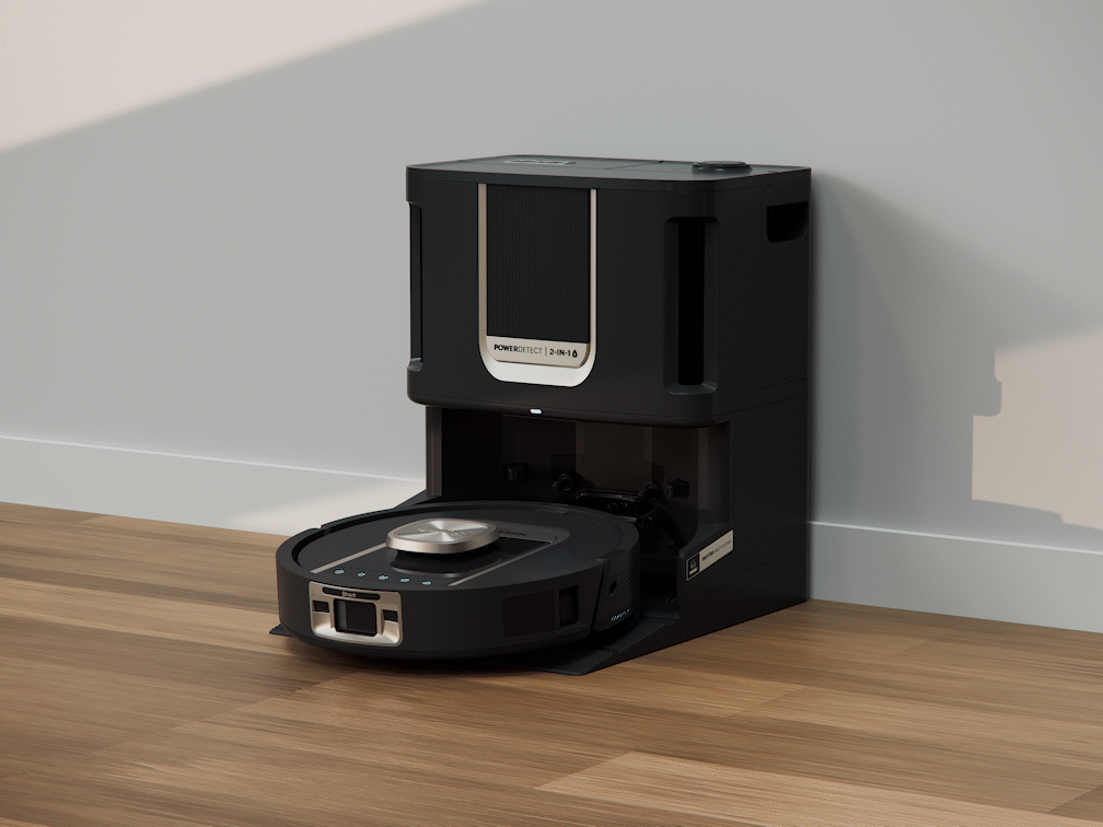 Robot aspirateur Shark se connectant &agrave; sa base pour vider les d&eacute;bris.