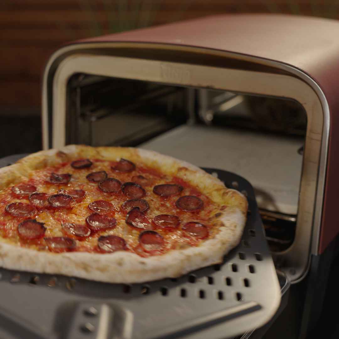 Image d'une pizza dans le four