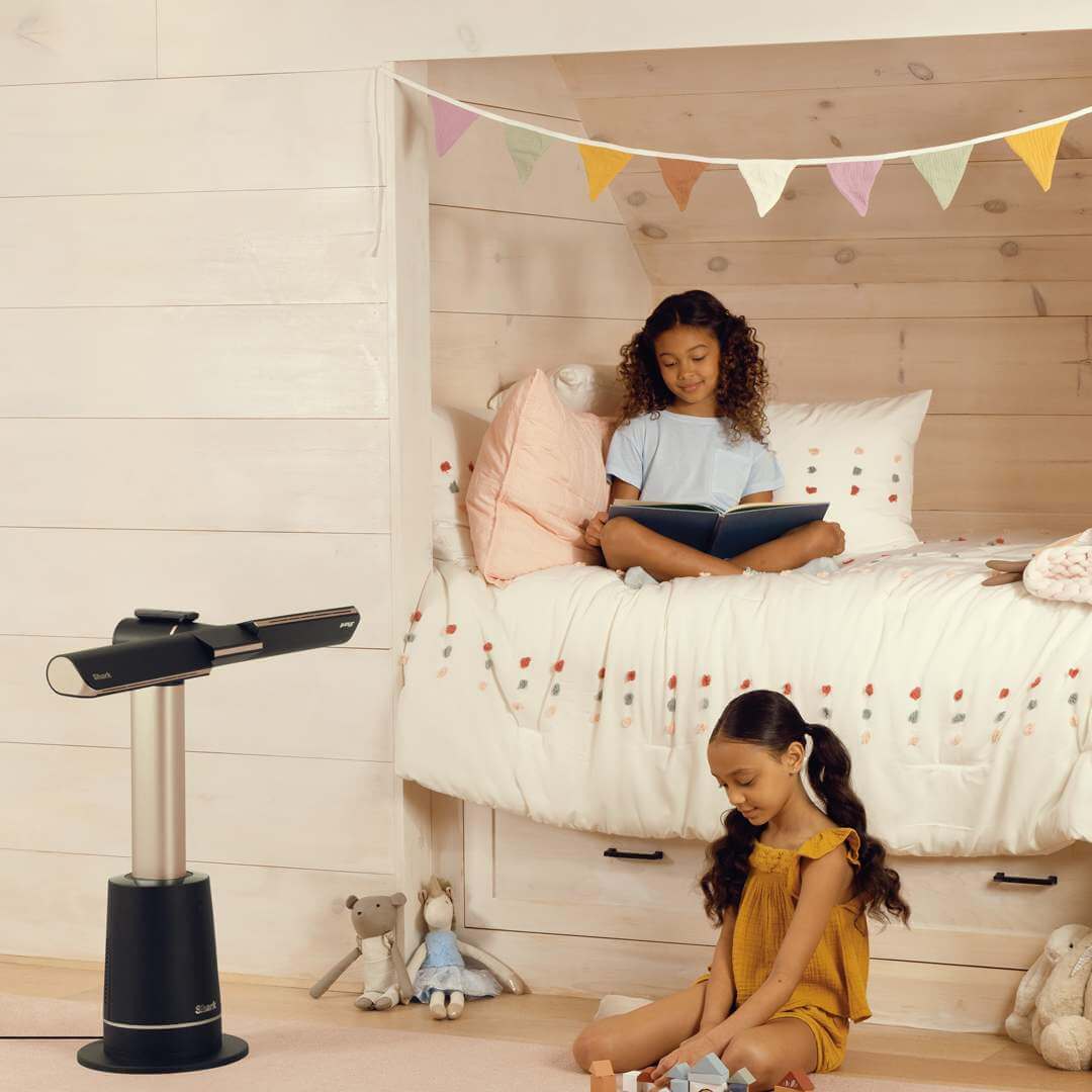 Image of two children in the bedroom with Shark Turbo blade fan by the side
