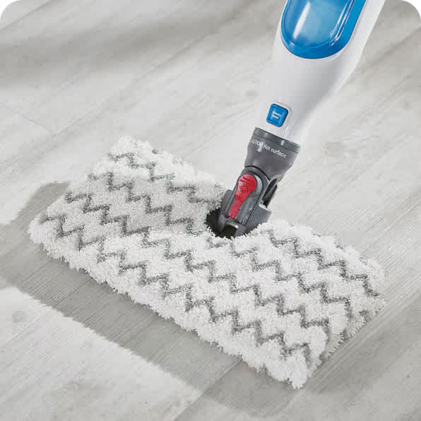 A Shark steam mop on a hard floor