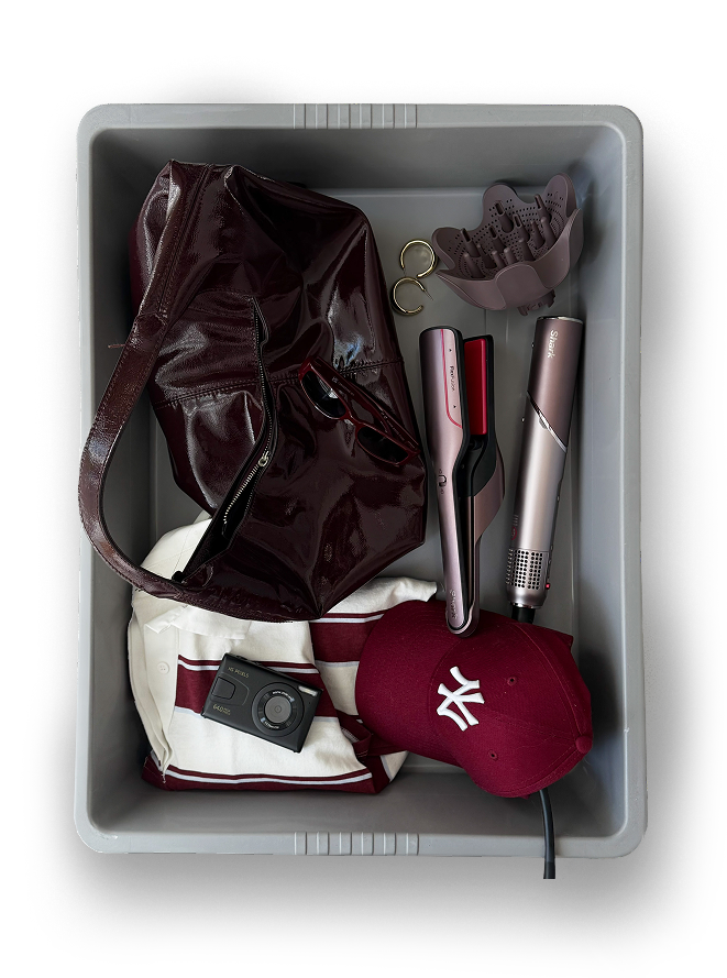 Airport tray packed with beauty holiday essentials